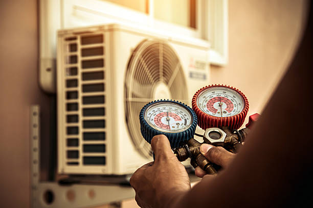 Professional Air Conditioning Service technician working in Ashland, PA